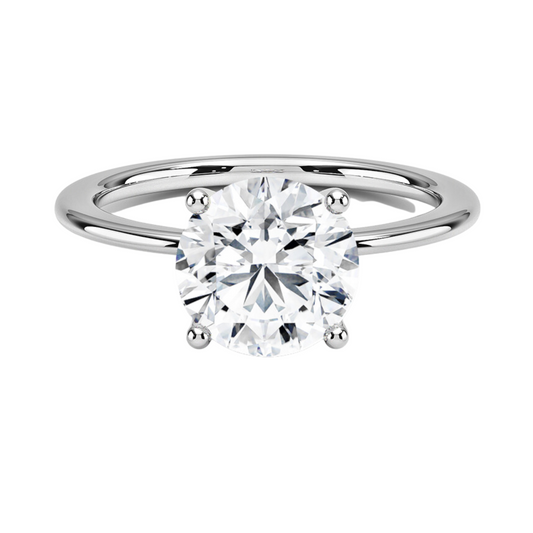 Eva 单石戒指镶有圆形明亮式切割钻石